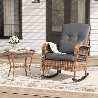 Chaise berçante de patio en rotin avec coussin épais et dossier haut pour porche de jardin
