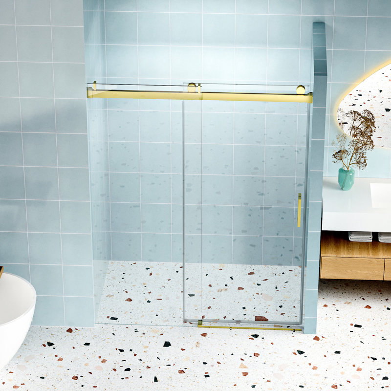 La porte de douche 60 po x 76 po, dorée, en verre trempé de 1/4 po, offre un fonctionnement en douceur avec des roulettes spéciales de 55 po - offre une expérience de glissement de précision