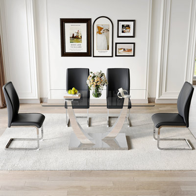 Ensemble de table et de chaises. Table de salle à manger moderne, plateau de table en verre trempé et pieds de couleur argent. Combiné avec une chaise en polyuréthane doux et confortable, parfait pour le dîner, les réunions, la maison et le bureau.