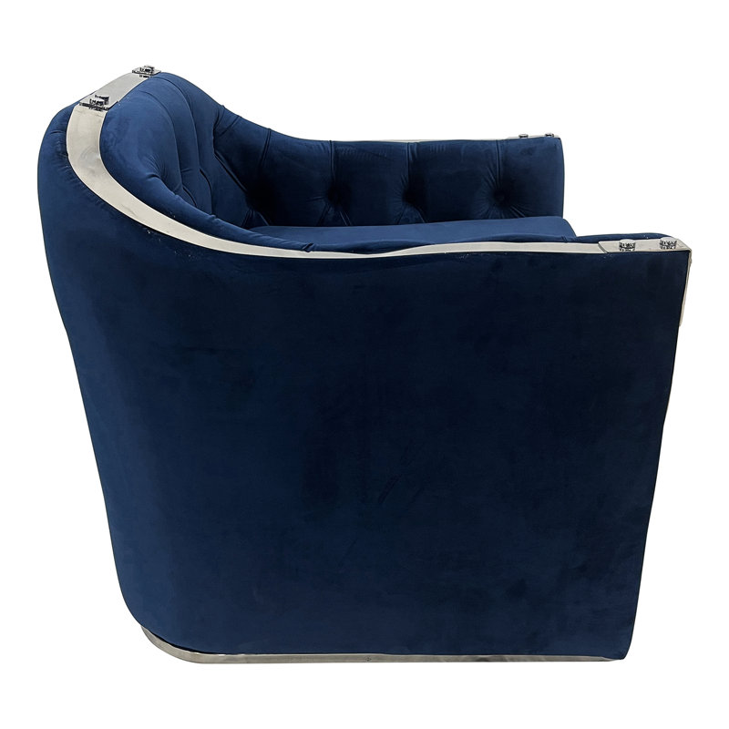 Chaise en velours bleu marine avec structure en acier inoxydable argenté brillant