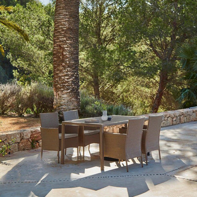 Renfoe 4 - Person Wicker Patio Dining Set with Rectangular Table , Cushions Included