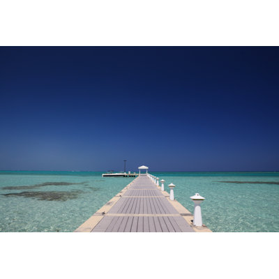 Pier In The Clear Waters by Jeremy Edwards - No Frame Art Prints on Canvas