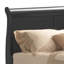Grand lit traditionnel noir en bois massif pour une chambre classique au design intemporel