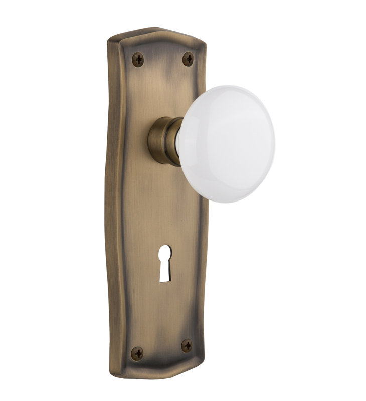 Prairie Plate with Decorative Keyhole and White Porcelain Door Knob, Antique Brass, 2-3/8”