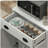 Microwave oven cabinet with storage drawer, double-door cabinet with adjustable shelves, dining table with storage shelves and cable holes, storage cabinets for kitchen, dining room, living room, white