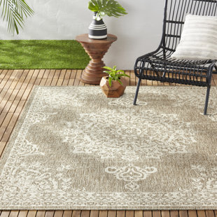 Tapis taupe / ivoire Nicole Miller