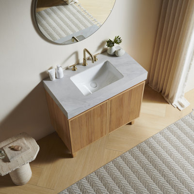 Meuble-lavabo LULA 36, sur pied, comptoir en pierre frittée gris Carrara veinée et lavabo en céramique avec 3 trous pré-percés pour robinetterie, démonté, sans robinetterie ni bonde, couleur bois naturel