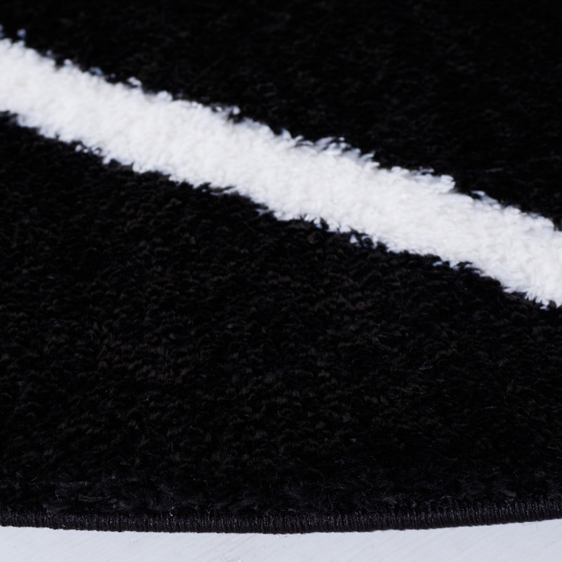 Tapis noir et blanc à motif géométrique, Rond 6 pi 7 po