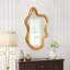 Miroir mural 33,46 x 22,24 de forme irrégulière avec cadre en bois naturel, parfait pour une décoration intérieure unique et élégante