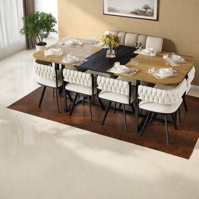 Ensemble de table de salle à manger moderne en bois bicolore avec chaises en velours, idéal pour les repas en famille