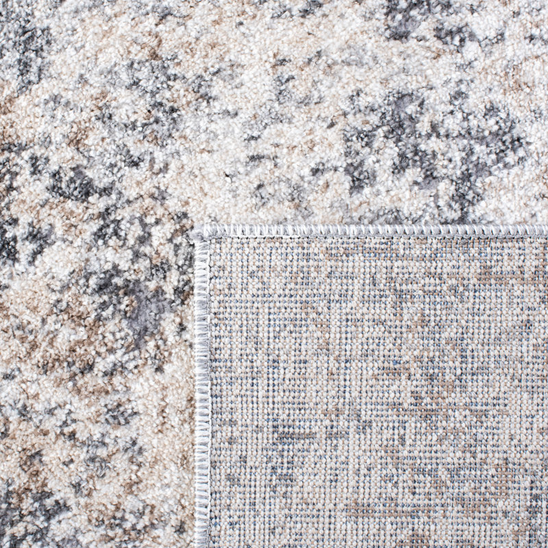 Ivory and Grey Abstract 10' x 14' Stain-Resistant Synthetic Area Rug