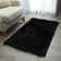 Tapis noir à poil long Enrica