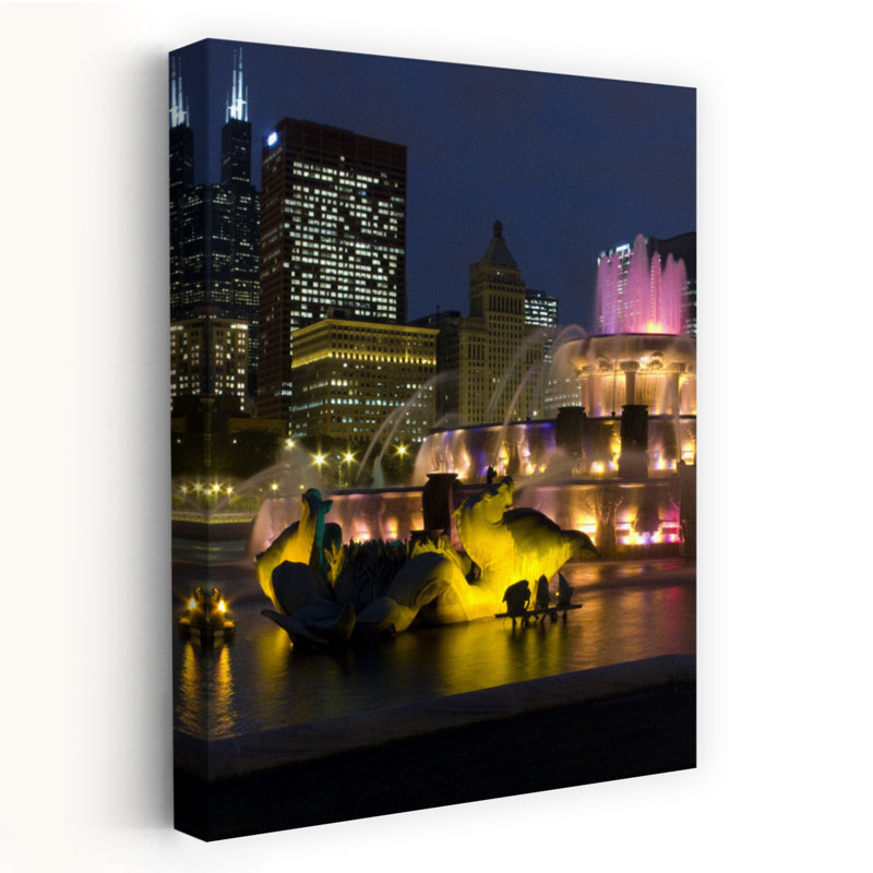 Illuminated Fountain With Skyscrapers In A City Buckingham Fountain Grant Park Chicago Illinois USA by Alex Kedler - Wrapped Canvas Print