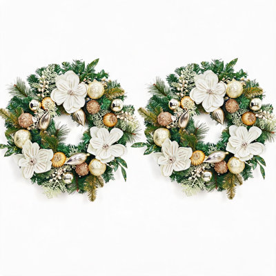 Couronne de Noël pré-illuminée (2 pièces) de 61 cm (24 po) avec fleurs de magnolia et boules dorées, 20 DEL et minuterie, fonctionne sur piles, pour porte d'entrée, mur ou fenêtre