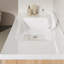 Meuble-lavabo simple en rondins