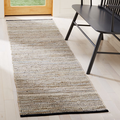 Tapis beige en cuir Exley
