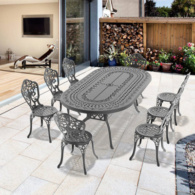 Ensemble de salle à manger 9 pièces en aluminium moulé avec cadre noir, motifs rectangulaires, revêtement, design ergonomique, patins antidérapants pour meubles d'extérieur, motif pétale et