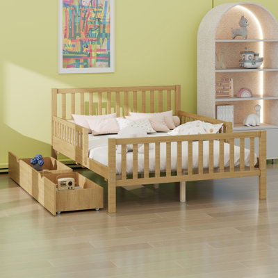 Lit plateforme en bois comprenant deux garde-corps latéraux et deux tiroirs de rangement pour la chambre à coucher