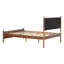 Grand lit avec tête de lit tapissier en cuir brun, structure en bois
