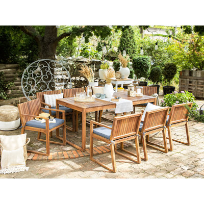 Iwar 8 - Person Acacia Solid Wood Patio Dining Set Rectangular Table with Cushions Included