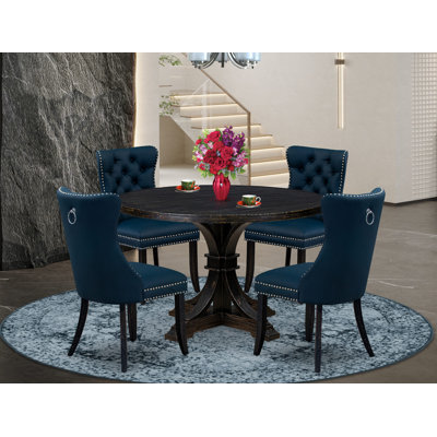 L'ensemble de table de salle à manger 5 pièces comprend une table ronde avec piédestal et 4 chaises rembourrées en tissu de polyester bleu marine, noir sablé