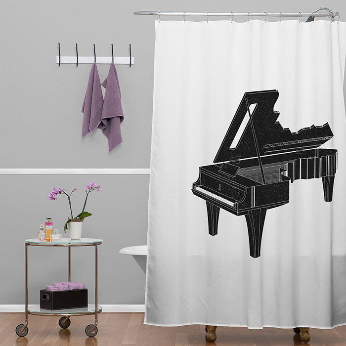 Le rideau de douche simple et les crochets de la musique sont les clés