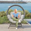 Fauteuil pour patio en osier avec coussin-1781158590