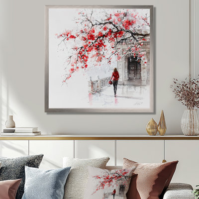 Femme marchant sous un arbre en fleurs en hiver - mode femme, art mural
