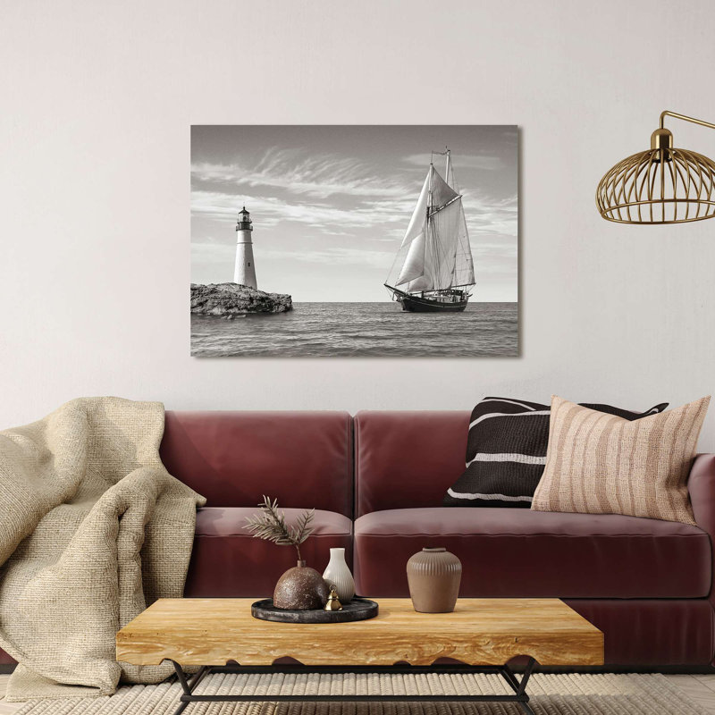Photograph Of A Sailboat Approaching Lighthouse, Mediterranean Sea by Pangea Images - Print, 50cm H x 70cm W x 4cm D