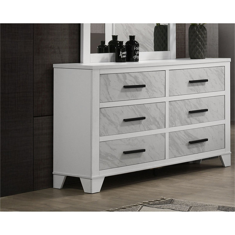 Commode blanche avec incrustation de faux marbre, poignées noires et glissières centrales en métal
