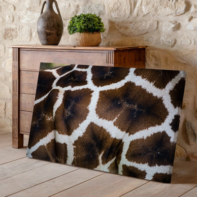 Toile vue de près d'un manteau de girafe mettant en vedette des motifs uniques de sa fourrure avec de riches nuances de création d'art mural sur toile