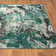 Abstract Machine Woven Polypropylene Area Rug in Green