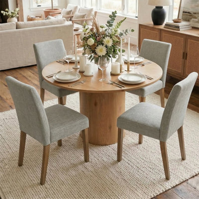 Danayla 4 - Person Dining Table Sets With 41.5'' Round Table & 4 Upholstered Linen Chairs