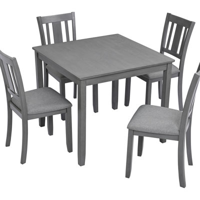 Élégante table de salle à manger en bois 5 pièces avec 4 chaises, parfaite pour les cuisines modernes et les petits espaces, alliant style et fonctionnalité.