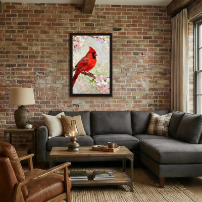 Animaux, cardinal rouge perché parmi les cerisiers en fleurs