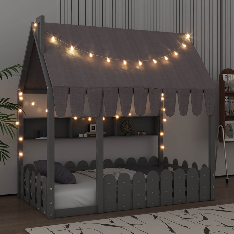Lit de sol pour enfants de style Montessori équipé d'une barrière de sécurité, d'un auvent, d'un éclairage et de trois unités de rangement