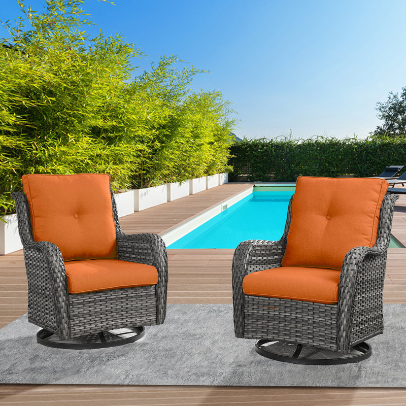 Chaise berçante pivotante en osier avec coussins Tonry, Orange