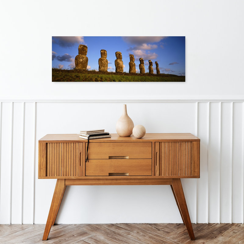 Low Angle View Of Statues In A Row Moai Statue Easter Island Chile by Kevin Schafer - Wrapped Canvas Panoramic Print