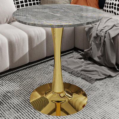 Table d'appoint ronde en marbre avec base piédestal conique, idéale pour le salon, design minimaliste moderne