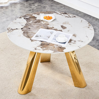 Table ronde luxueuse de 42 po avec plateforme en pierre vitrifiée blanche et pieds dorés avec motif de pieds brûlants de 42 po pour des décors charmants