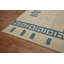 Tapis rustique bleu et crème à motifs géométriques 6 x 8