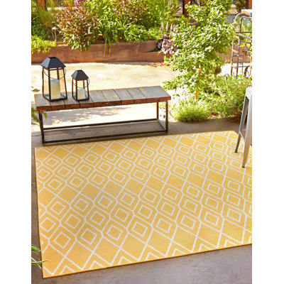 Tapis d'extérieur couleur or