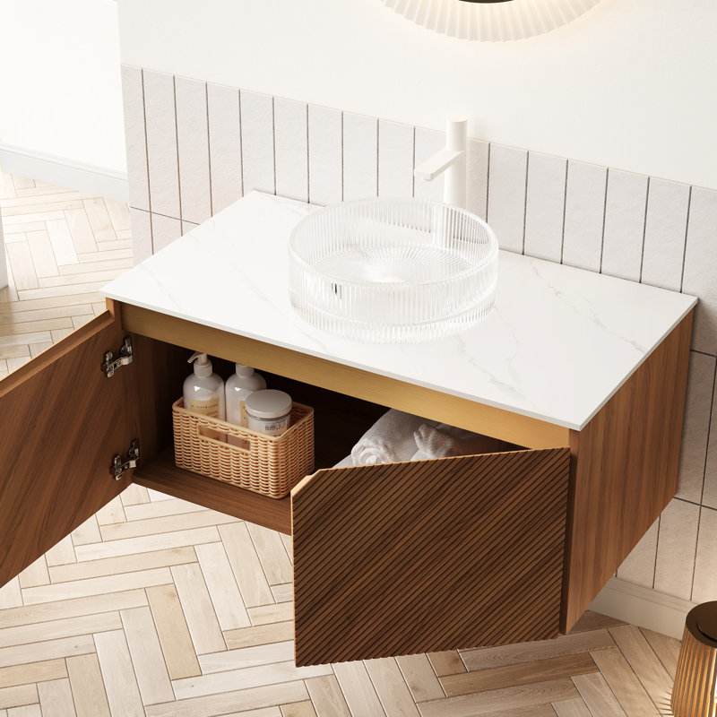Meuble-lavabo de 36 po avec vasque ronde en verre transparent, plateau en pierre frittée blanche, rangement en contreplaqué flottant, portes doubles en sergé avec garniture en métal et armoire à fermeture en douceur