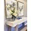 Magnolia and Delphinium Arrangement in a Decorative Ceramic Vase