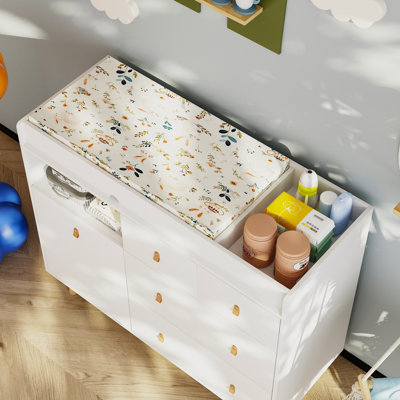 Commode à langer avec 4 tiroirs Stroman