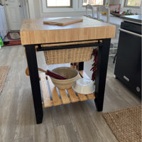 Behling Solid Butcher Block Kitchen Island with Baskets and Storage Shelf