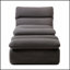 Pouf ergonomique rembourré avec repose-pieds pour une détente optimale et un soutien corporel parfait dans les espaces de vie.