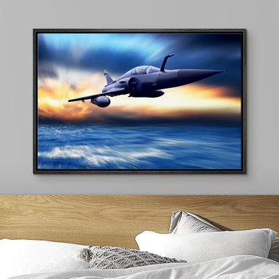 " High-speed Fighter Jet Against The Beautiful Cloud Background "