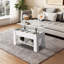 Sherreka Lift Top Four Leg Coffee Table with Storage