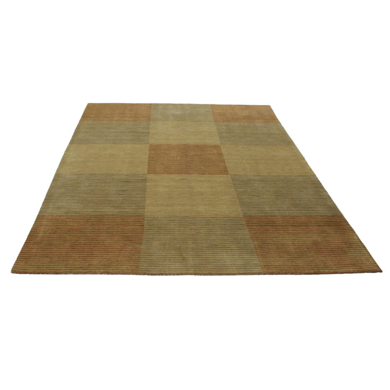Wasif Area Rug in Brown